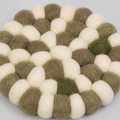 Close view of handmade wool felt ball texture