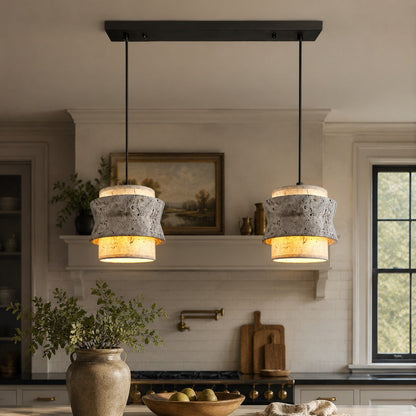 Style B gray travertine stone pendant lights above a kitchen island