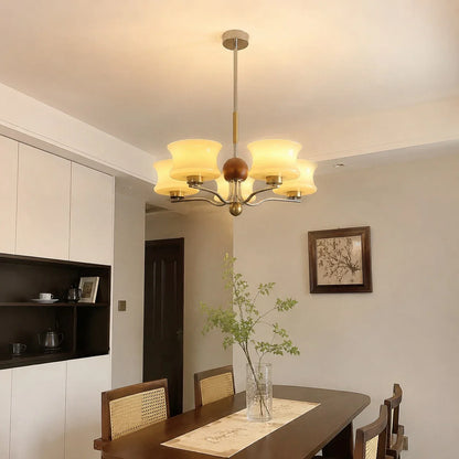 Cream glass chandelier over a dining table