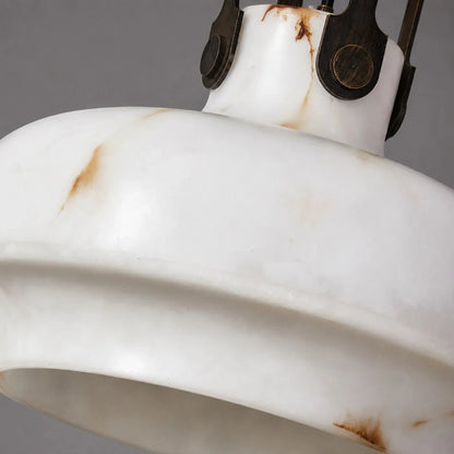 Close view of the softly lit faux alabaster shade