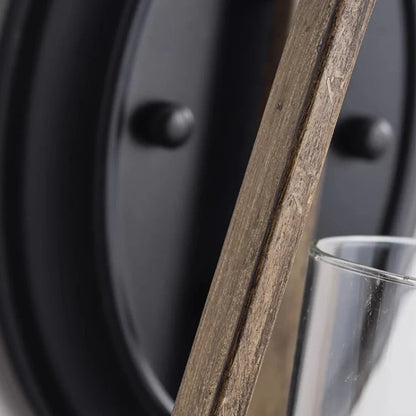 Rust finish texture close view on wall sconce arm