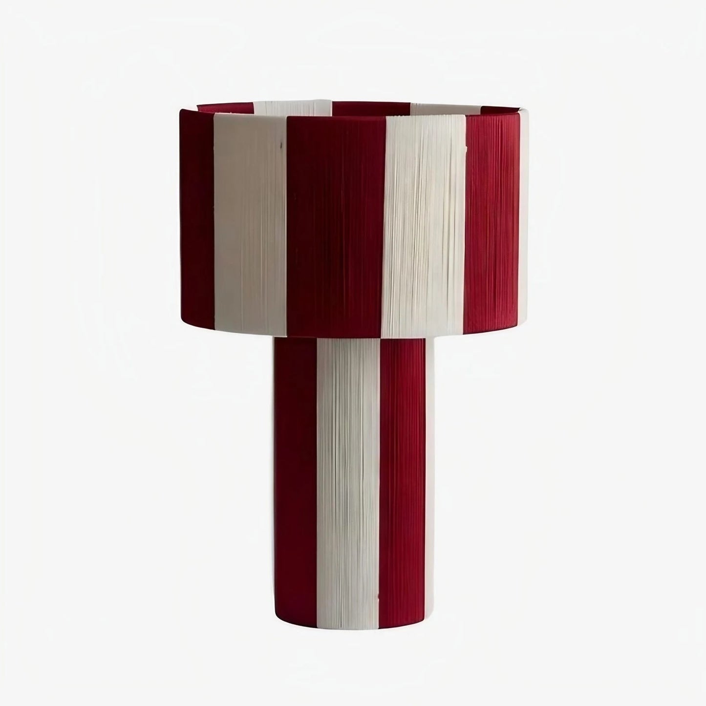 Burgundy purple and white striped woven shade table lamp on a white background