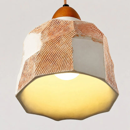 Warm lower glow and faceted shade edge