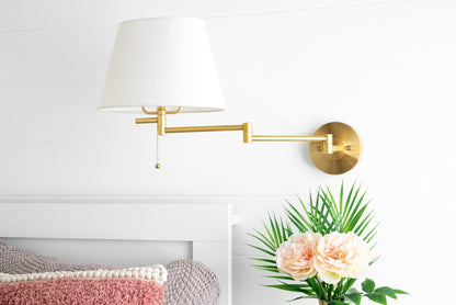Ornato Brass Swing Arm Wall Sconce with White Cloth Shade for Bathroom Vanity or Hallway