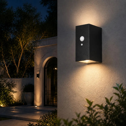 Style C outdoor wall lamp casting light on a garden entry wall