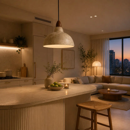 distressed pendant light over an open kitchen and dining area