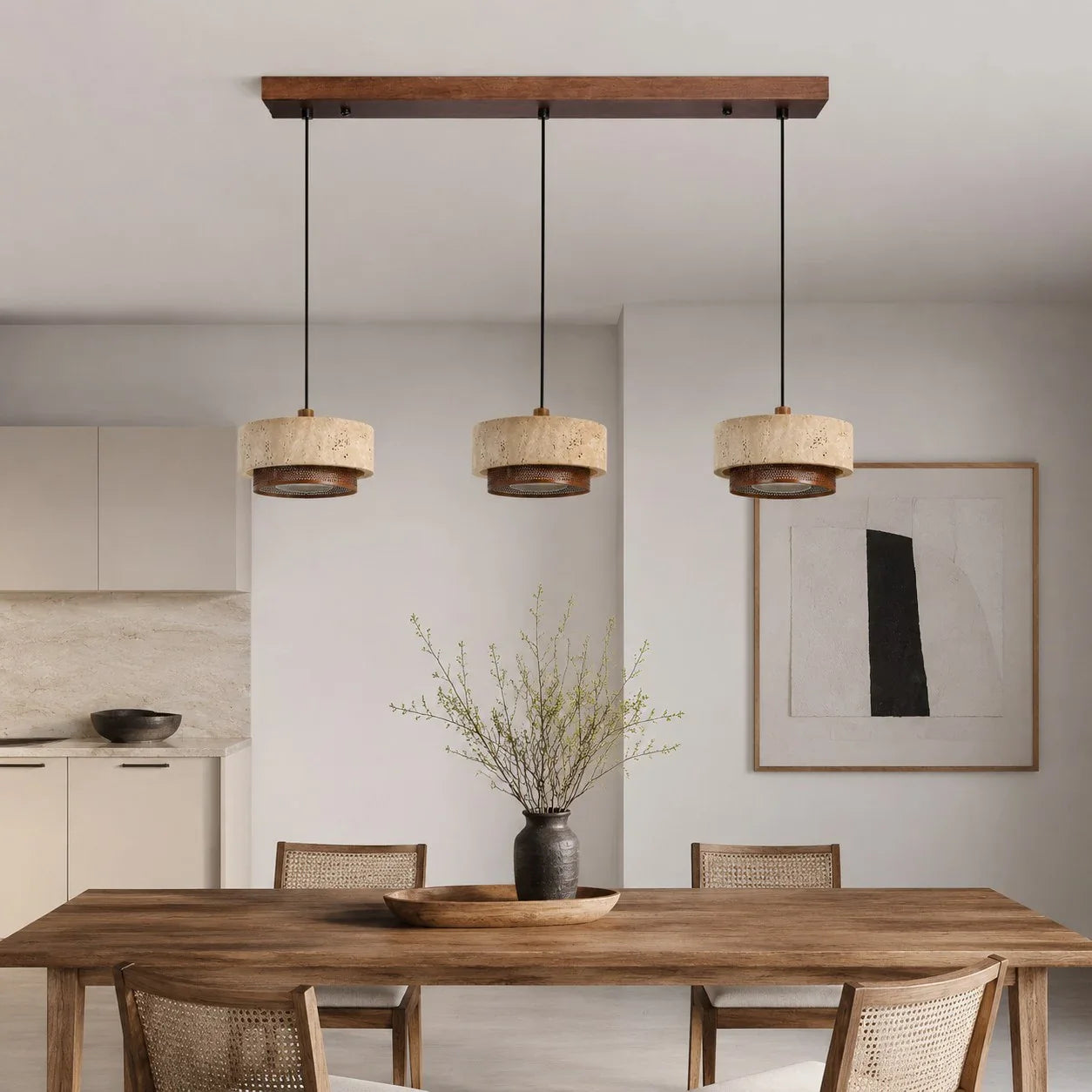 three head travertine pendant light over a dining table