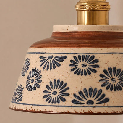 detail - ceramic rim and floral pattern