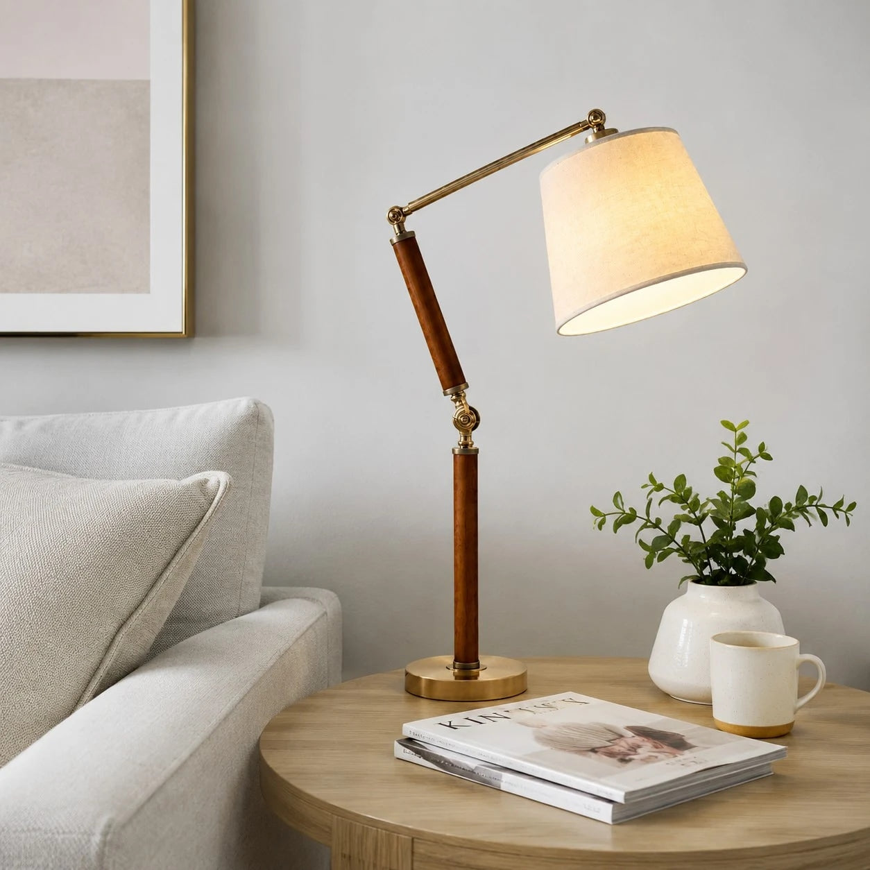 Warm fabric shade table lamp on a living room side table