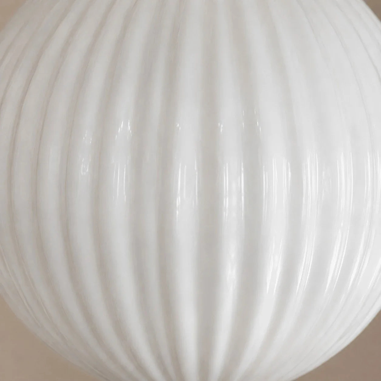 Close view of ribbed milk glass texture