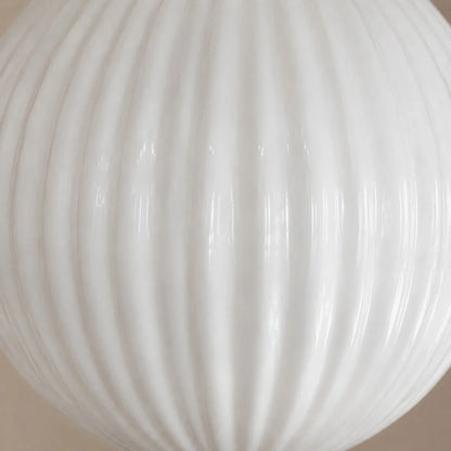 Close view of ribbed milk glass texture