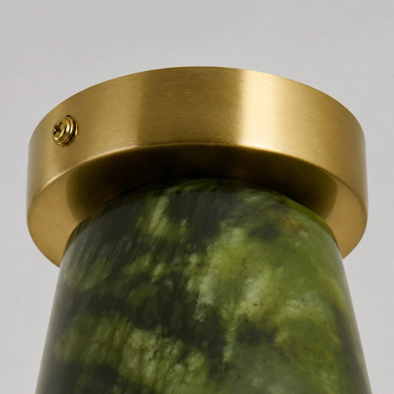 brushed gold metal ceiling cap detail
