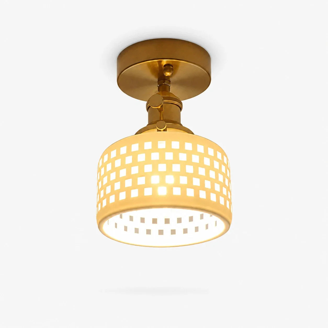 Flush mount grid ceramic ceiling light with brass canopy
