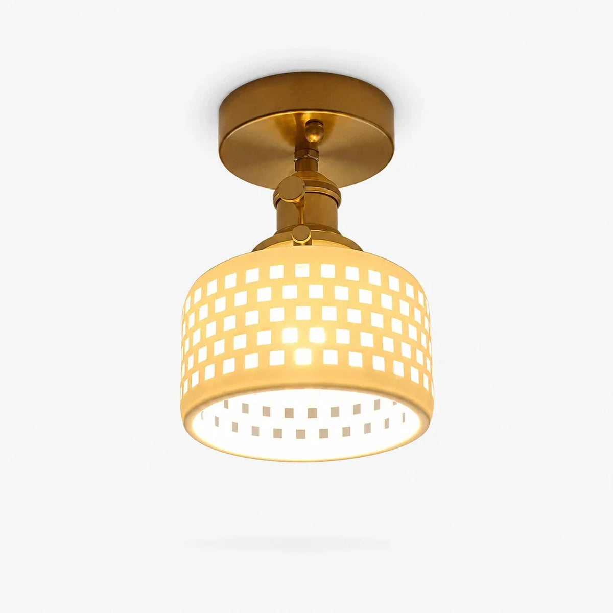 Flush mount grid ceramic ceiling light with brass canopy