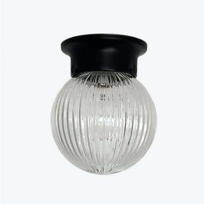 Minimalist Glass Ceiling and Black Metal Lamp