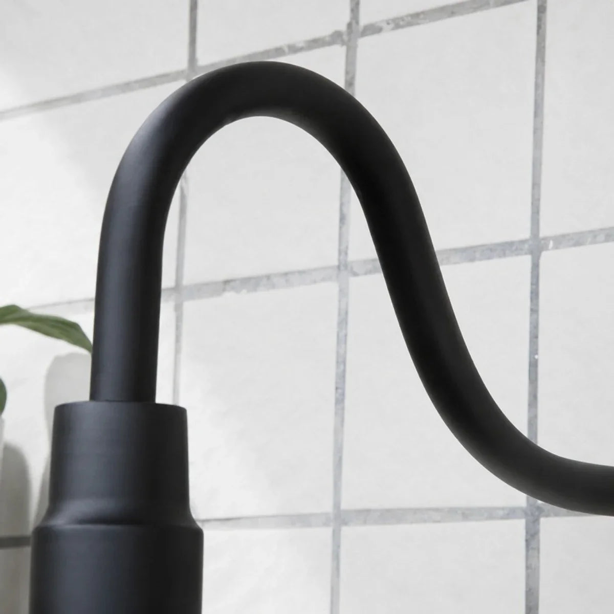 Matte black gooseneck arm and socket detail