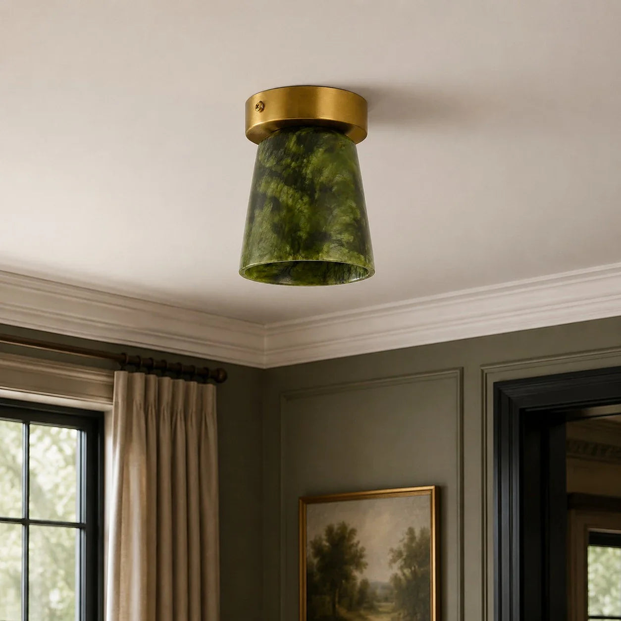 vintage green and gold ceiling light in a powder room scene