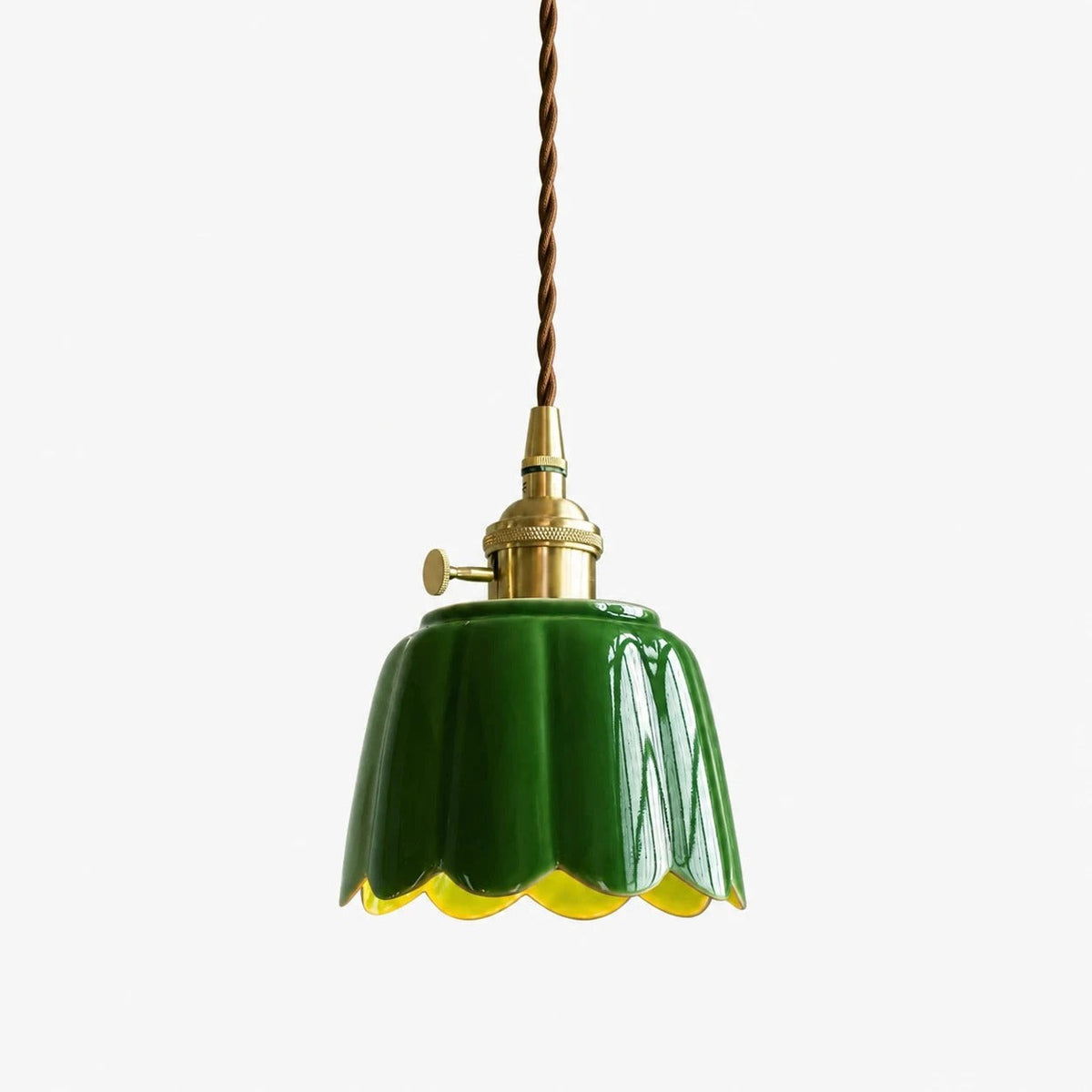 Imperial blue glaze ceramic lotus pendant light on clean background