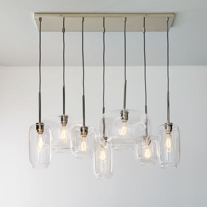 Lumivelle Sculptural 7-Light Chandelier – Adjustable Height Modern Glass Pendant