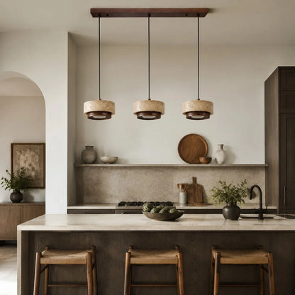 three head travertine pendant light over a kitchen island