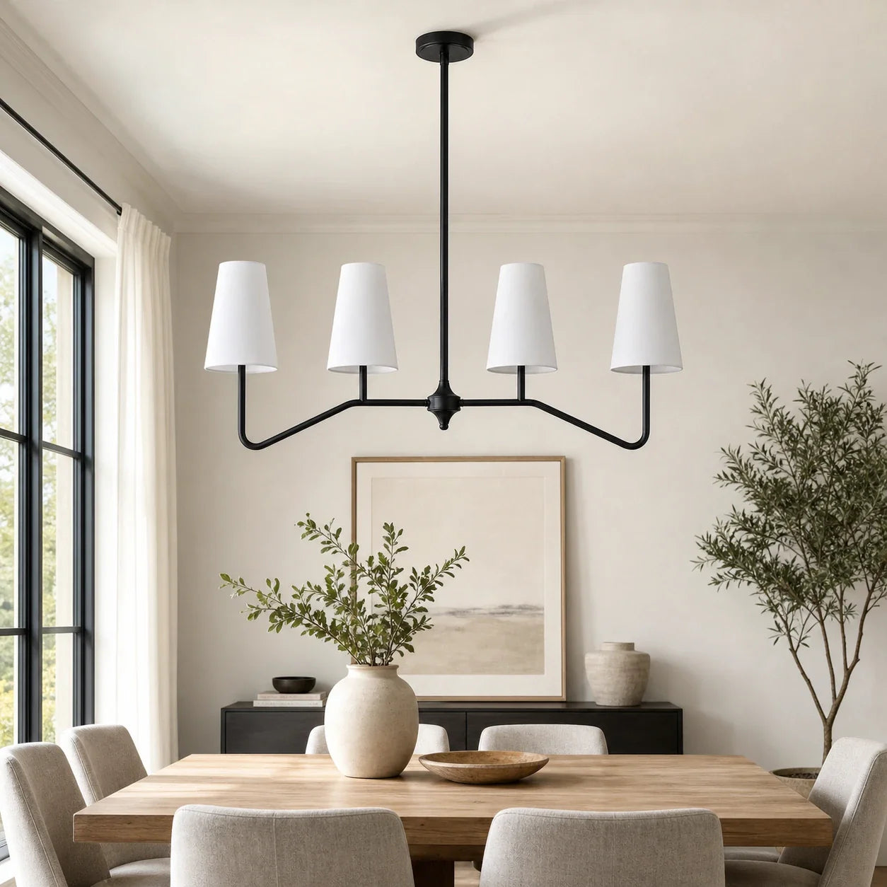 Strellux black linear chandelier in a dining room scene