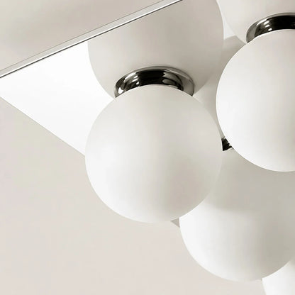 Detail image: close view of chrome fitting and glass diffuser.