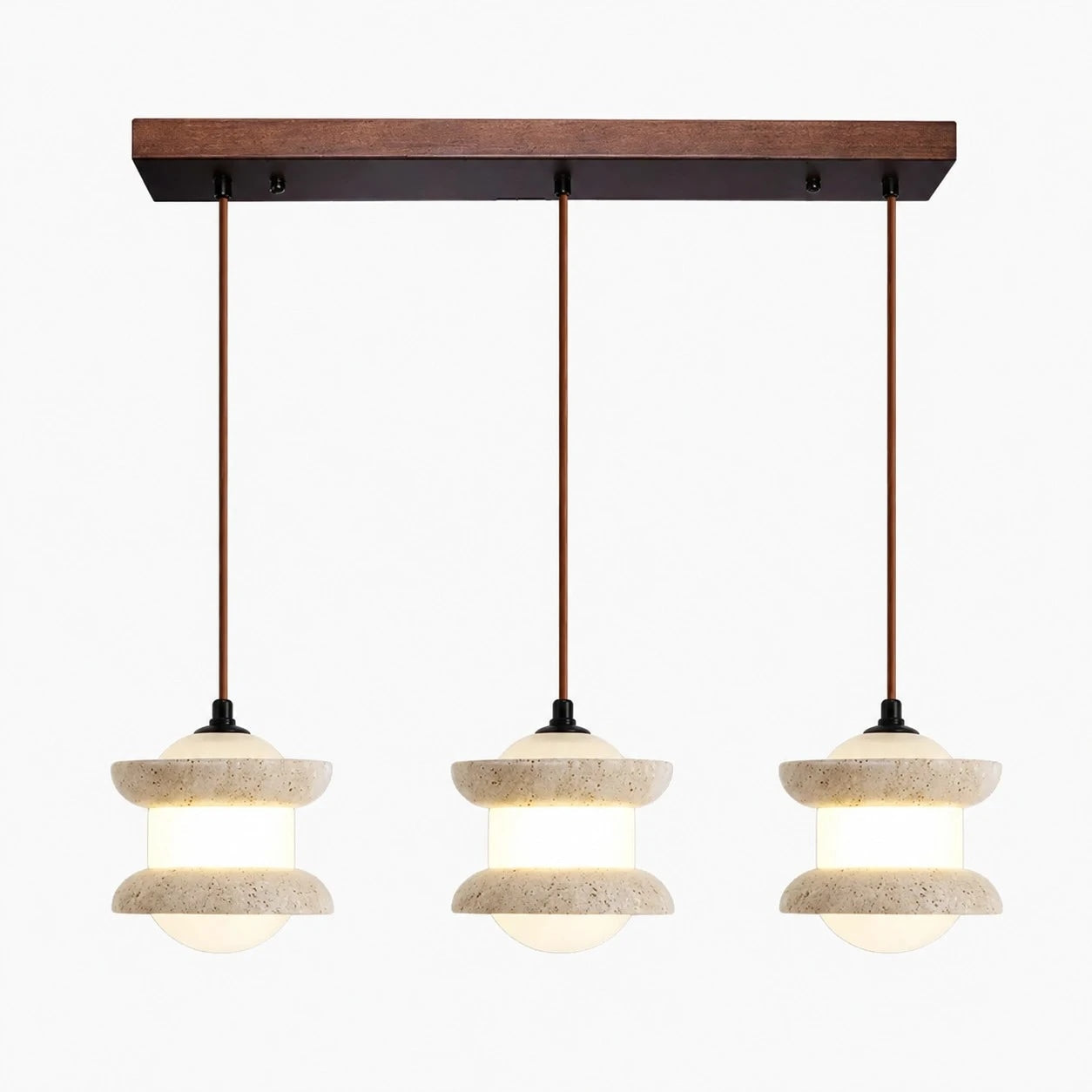 Three-light travertine stone pendant light on a plain background
