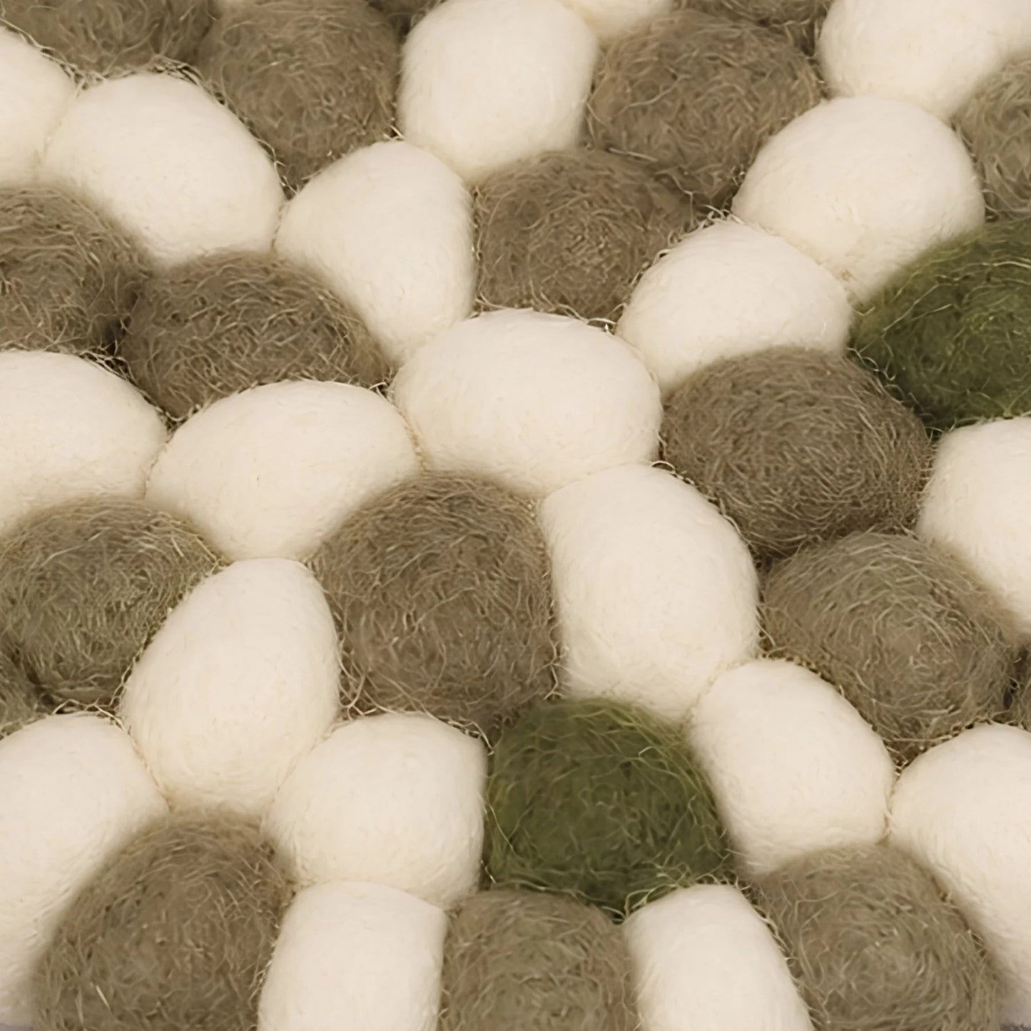 Close view of soft felt ball texture