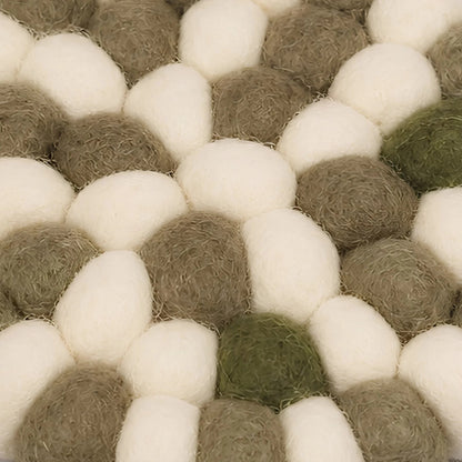 Close view of soft felt ball texture
