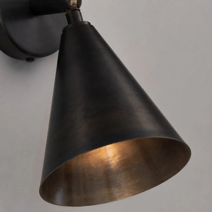 Cone shade and warm inner brass finish close-up