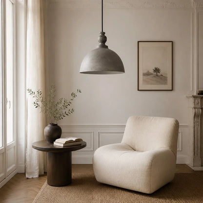 silver pendant light in a quiet lounge corner
