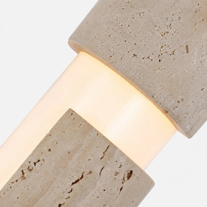 Warm acrylic diffuser and yellow travertine stone texture close view