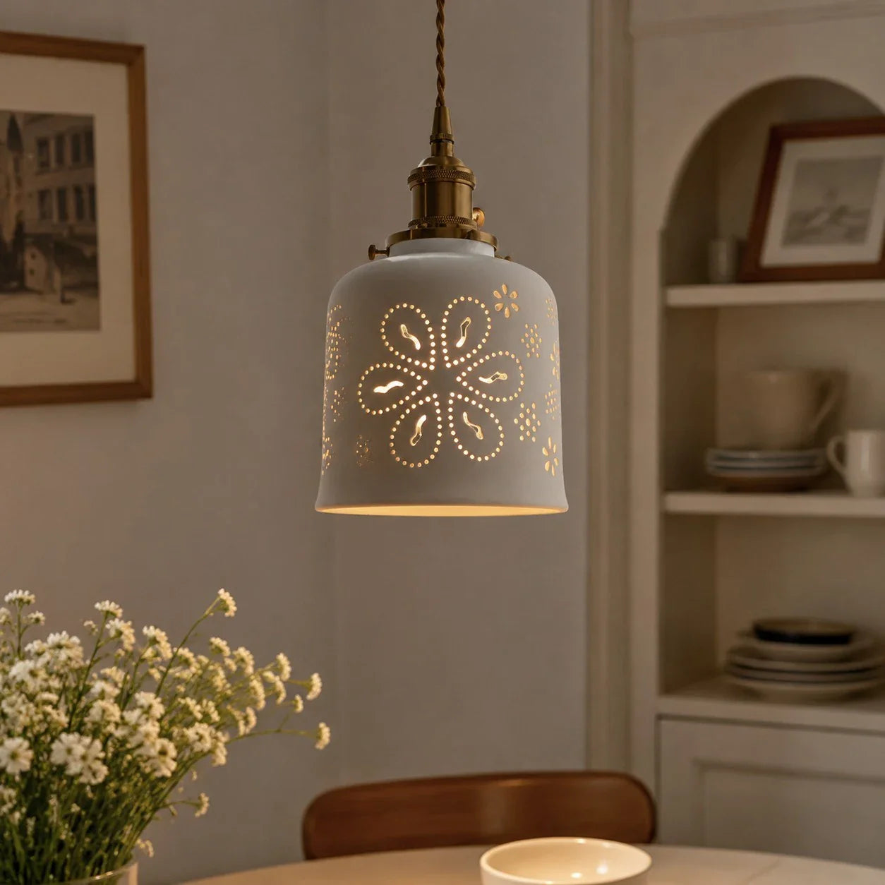 Floral ceramic pendant light in a cozy interior corner