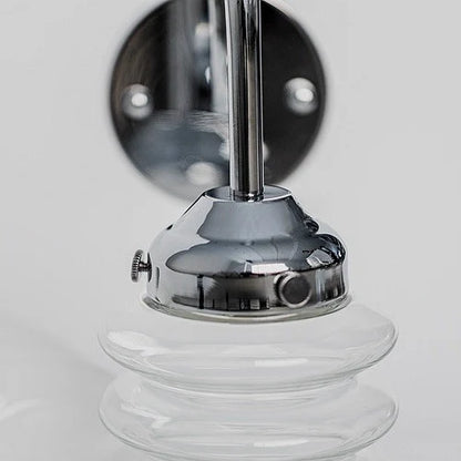 Chrome holder and clear ribbed glass shade detail