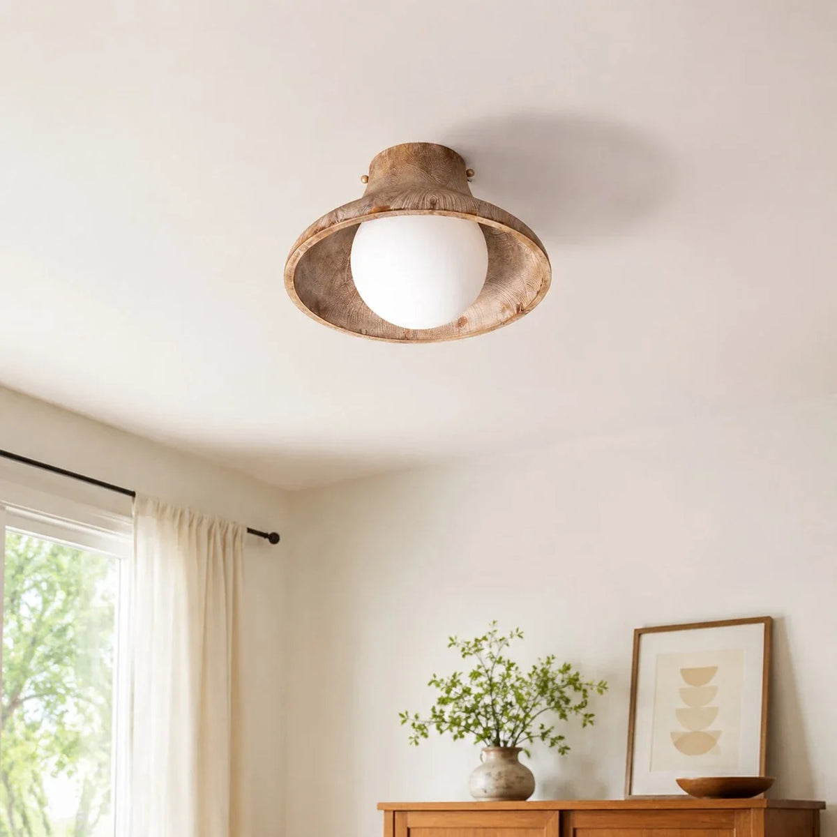 Natural wood ceiling light above a bright corner