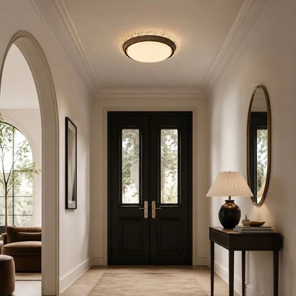 Flush mount ceiling fan light in an entryway