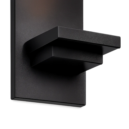 Black metal wall plate and shelf detail
