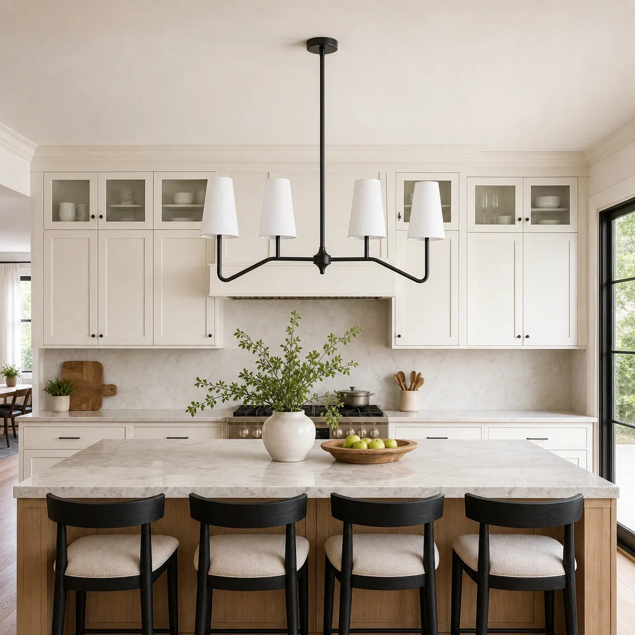 Strellux black linear chandelier above a kitchen island