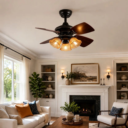 Black amber glass ceiling fan light installed in a living room