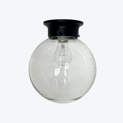 Minimalist Glass Ceiling and Black Metal Lamp