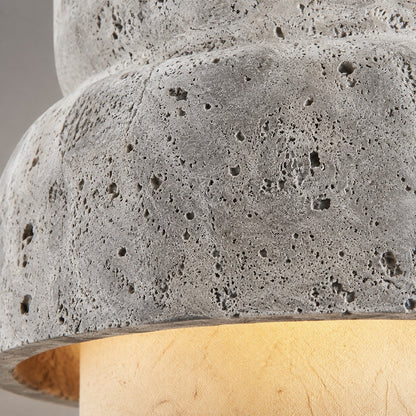 Macro close-up of porous gray travertine stone texture