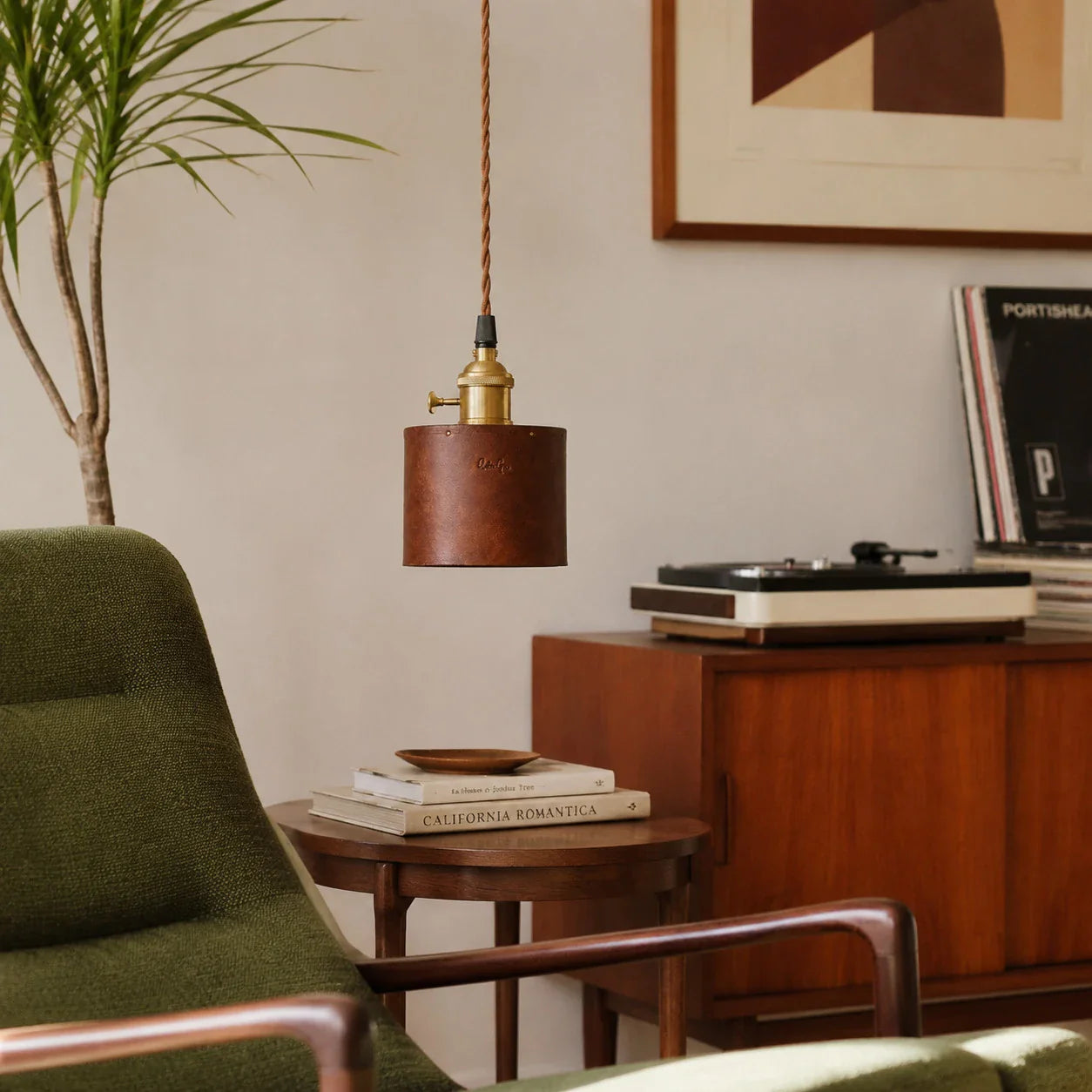 Brown leather pendant lamp in a vintage living room corner