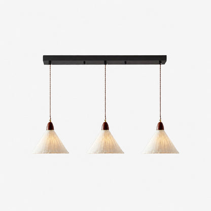 Yinan / A three-head pendant.