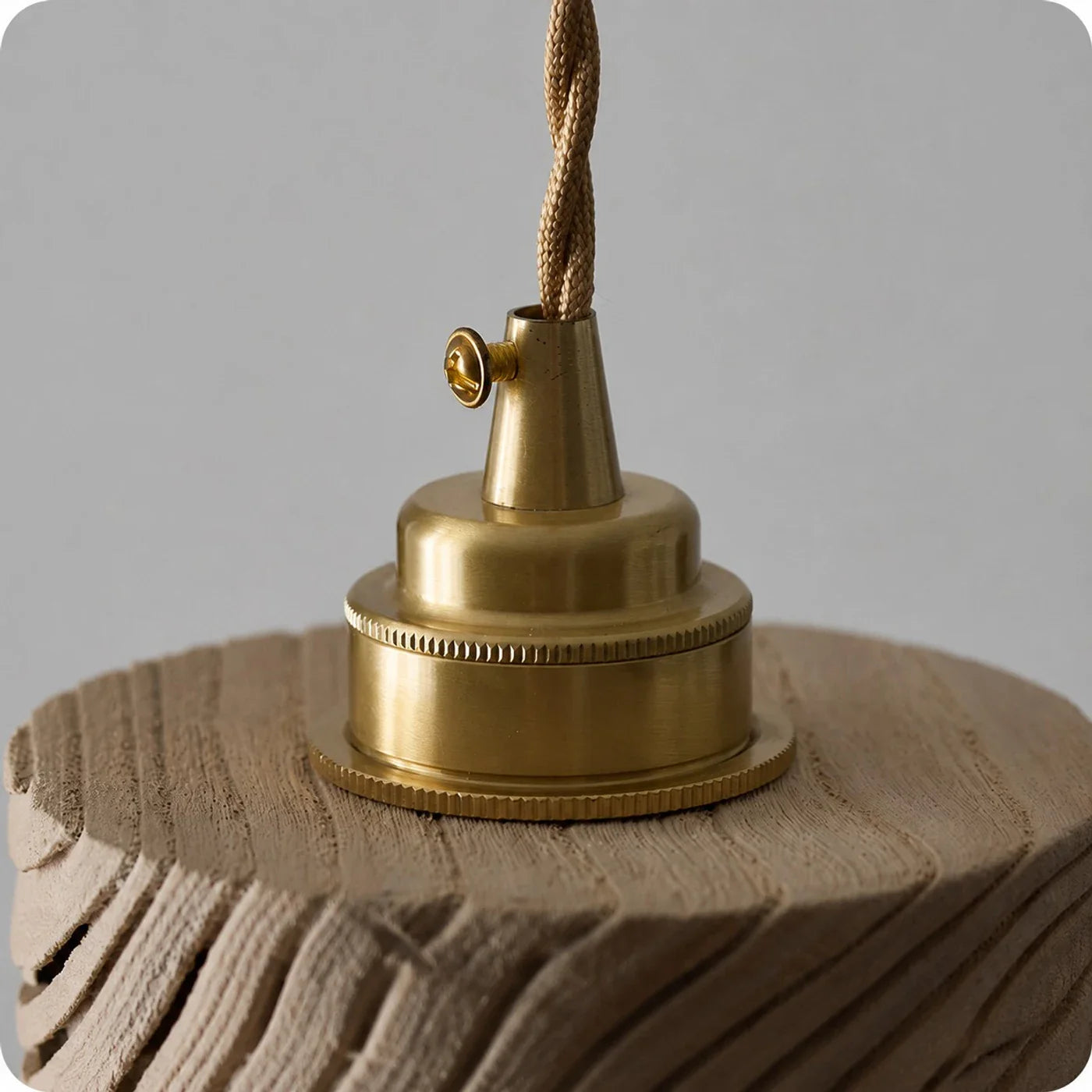 Brass canopy and woven cord detail