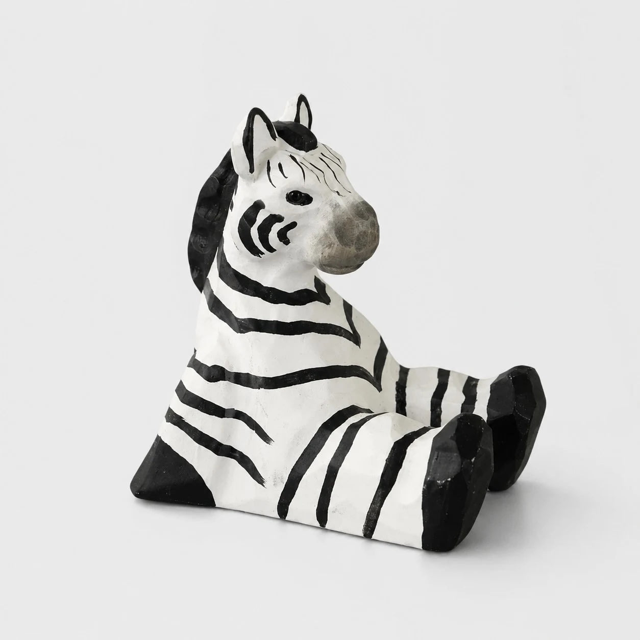 Hand-carved wooden animal phone stand