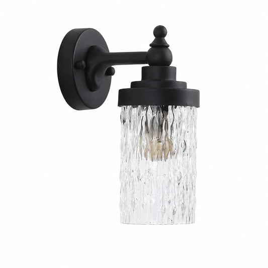 Black metal wall sconce with ribbed clear glass shade
