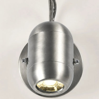 Close view of the sand nickel lamp body and side screws