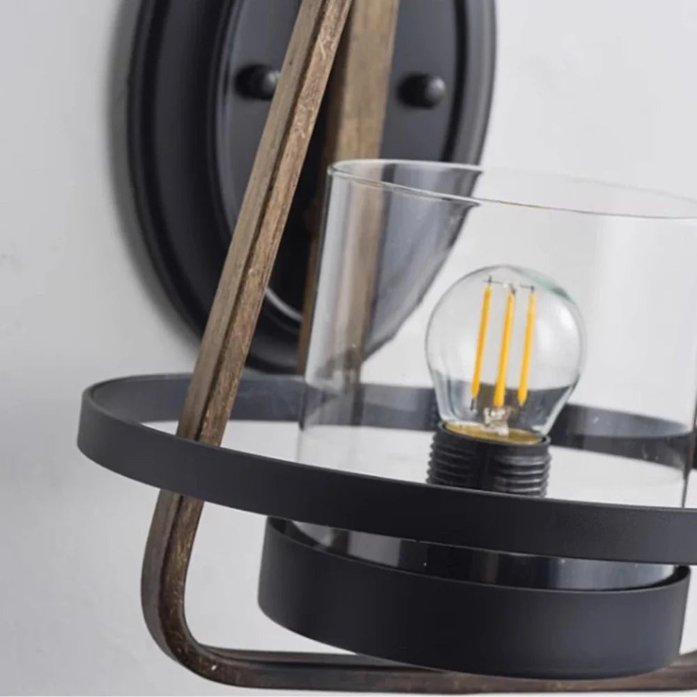 Clear glass shade and black metal lower ring detail