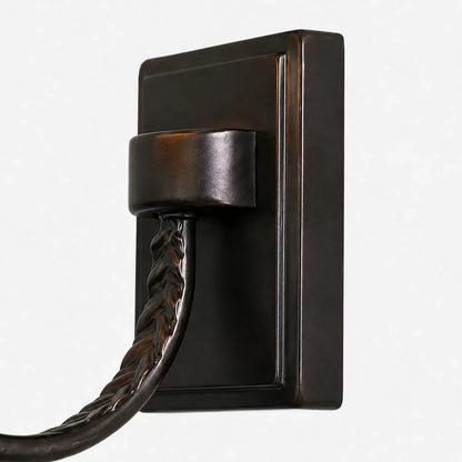Close-up of backplate and curved metal arm