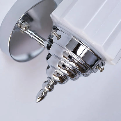 Chrome wall plate and decorative finial detail